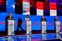Republican presidential candidates former New Jersey Gov. Chris Christie, left, former U.N. Amb ...