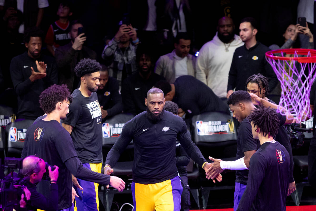 Los Angeles Lakers forward LeBron James (23) takes the court for an NBA In-Season Tournament se ...