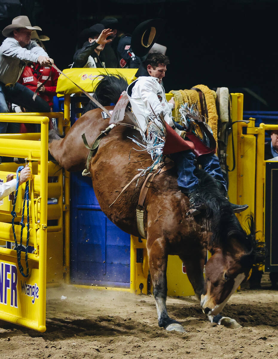 Kade Sonnier comes out of the bucking chute on Irish Eyes during his round one bareback ride at ...