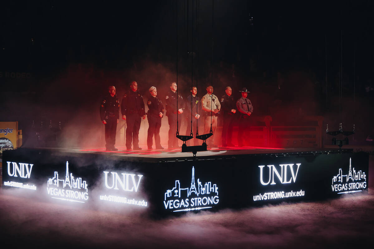 UNLV shooting first responders are honored during the opening ceremony of NFR at the Thomas &am ...