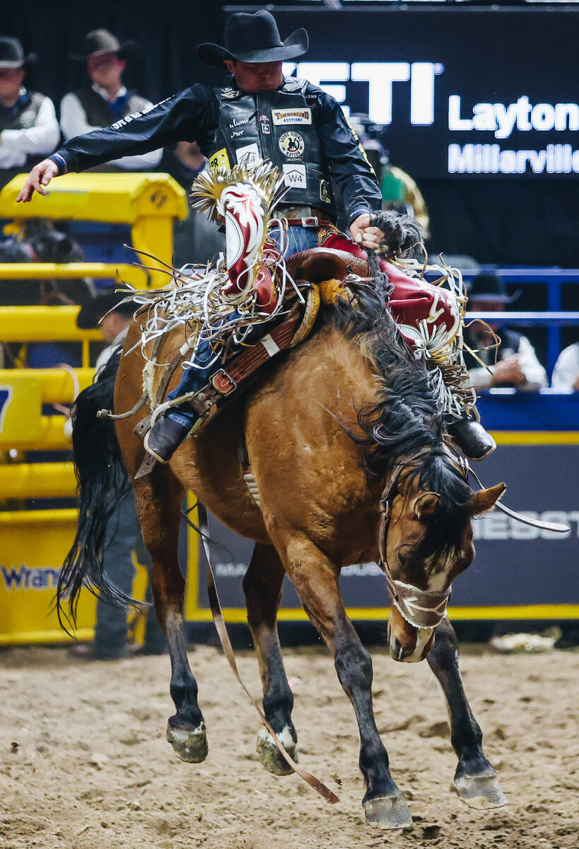 Wyatt Casper gets bucked during the saddle bronc riding portion of the National Finals Rodeo at ...