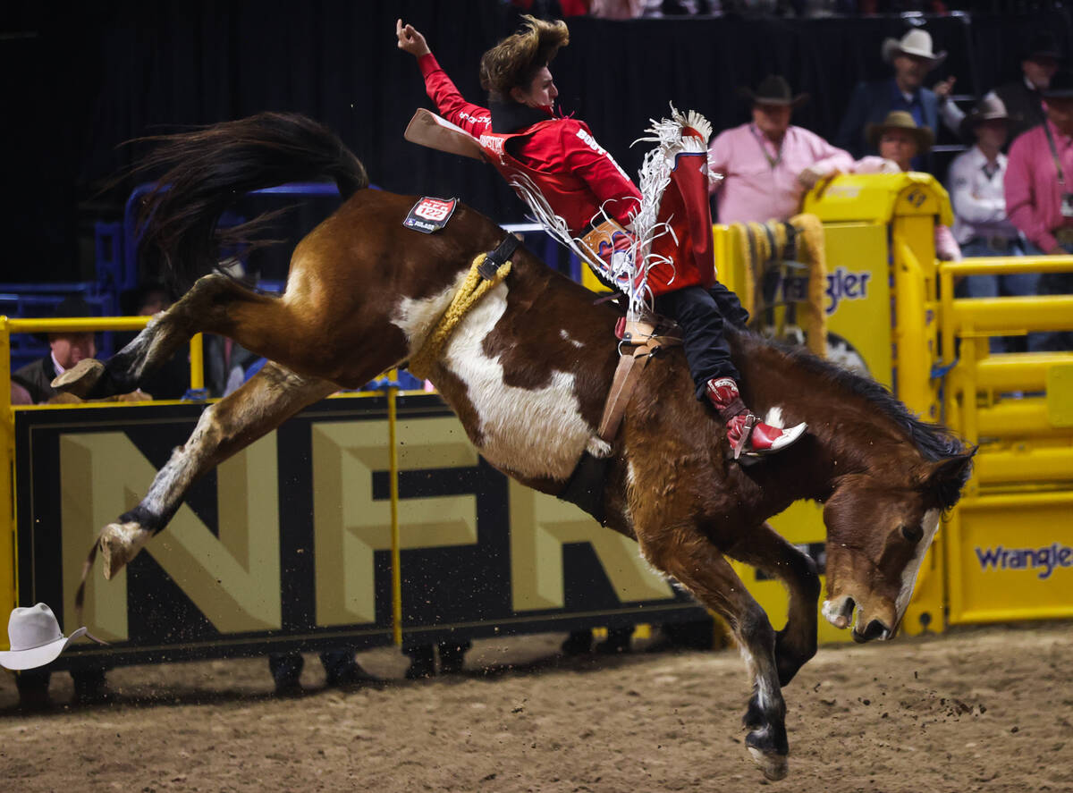Rocker Steiner holds on to his horse while he competes in bareback riding on day four of the Na ...