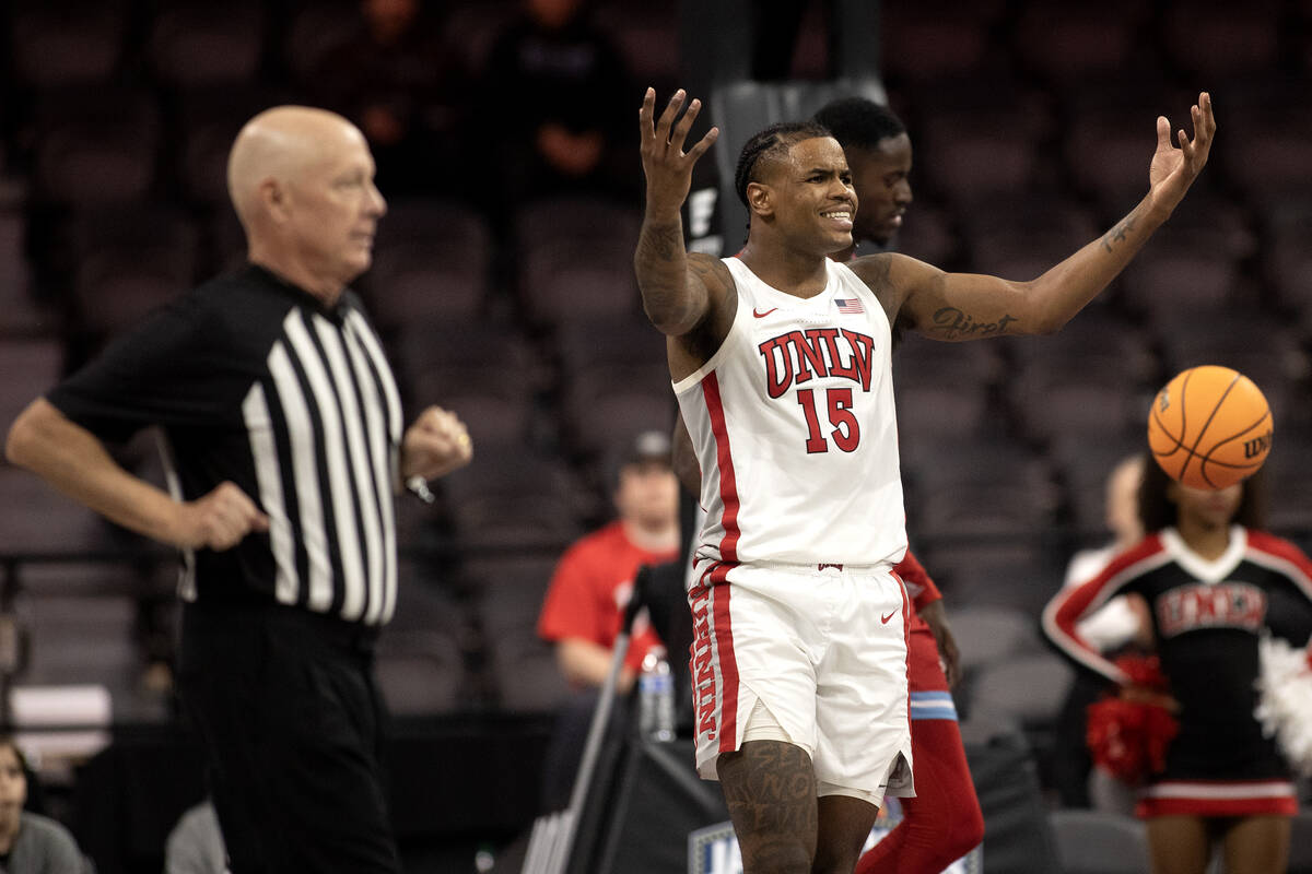 UNLV Rebels guard Luis Rodriguez (15) reacts after being charged with a foul during the second ...