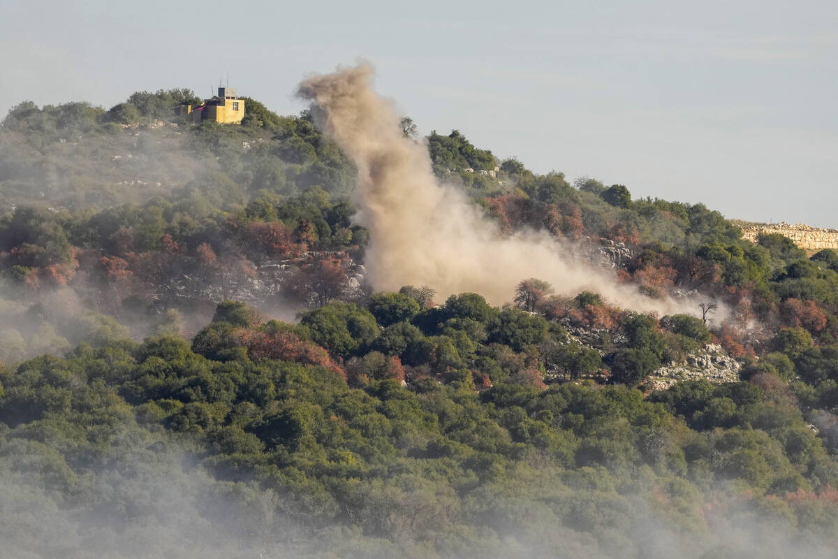 Smoke rises from Israeli artillery shelling on the outskirts of Yaroun, a Lebanese border villa ...