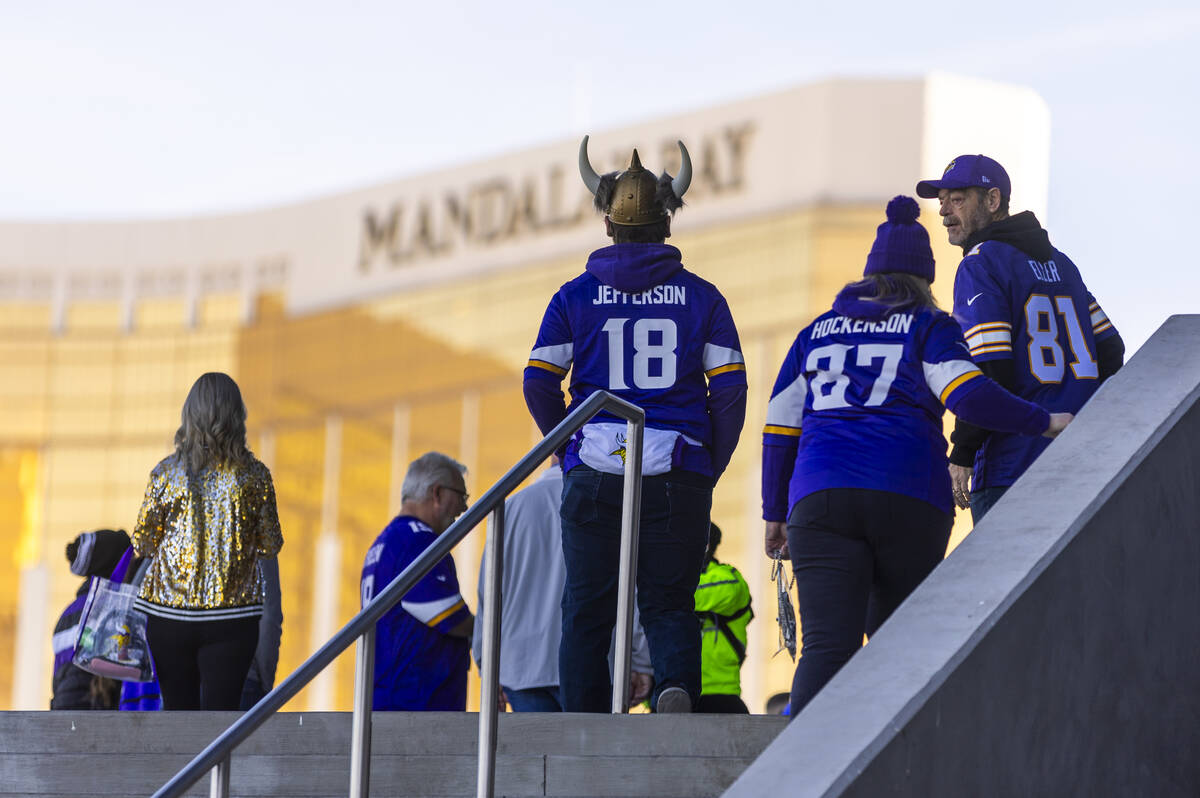 Fans gather outside the stadium before the Raiders face the Minnesota Vikings in the first half ...