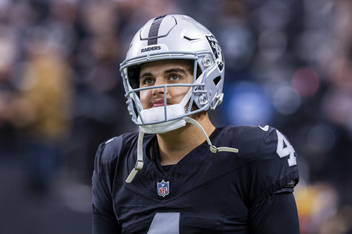 Raiders quarterback Aidan O'Connell (4) looks to the stands during warmups before the first hal ...