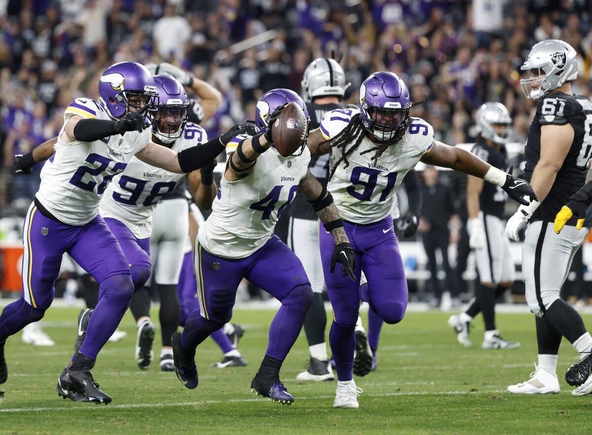 Minnesota Vikings linebacker Ivan Pace Jr. (40) celebrates with his teammates as Raiders guard ...