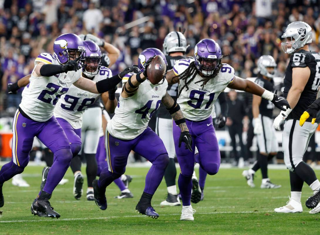 Minnesota Vikings linebacker Ivan Pace Jr. (40) celebrates with his teammates as Raiders guard ...