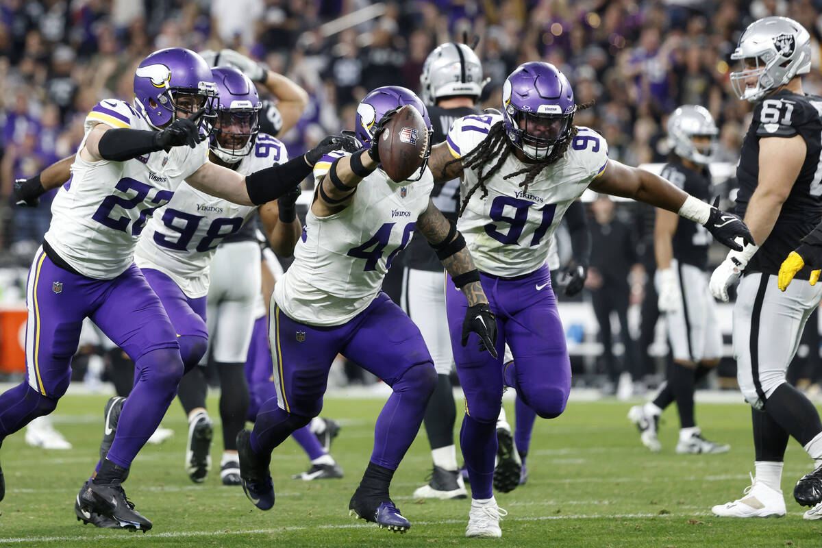 Minnesota Vikings linebacker Ivan Pace Jr. (40) celebrates with his teammates as Raiders guard ...