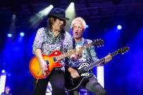 Gary Orton, left, and Kevin Cronin of REO Speedwagon perform at Sandbar Poolside at Red Rock Re ...