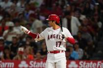 Shohei Ohtani reacts after swinging at a pitch during the ninth inning of the team's baseball g ...