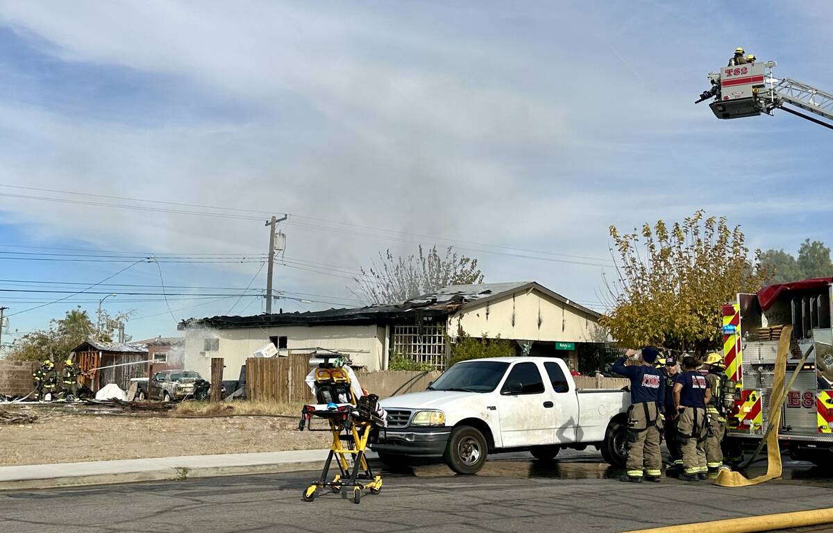 The Henderson Fire Department responded to a residential blaze on Shoshone Lane in Henderson on ...