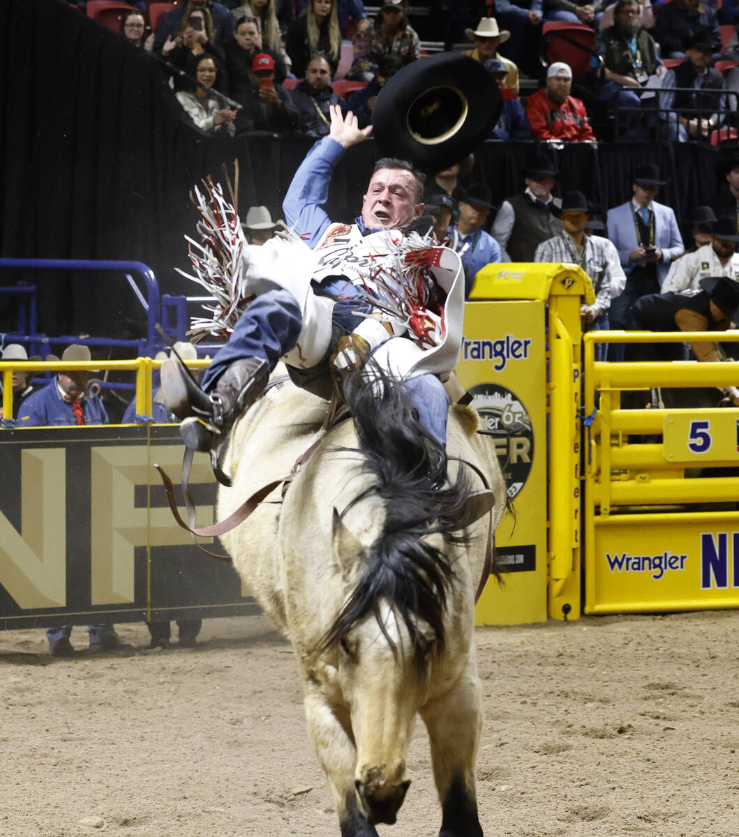 Tim O'Connell holds on to his horse while he competes in bareback riding on day six of the Nati ...