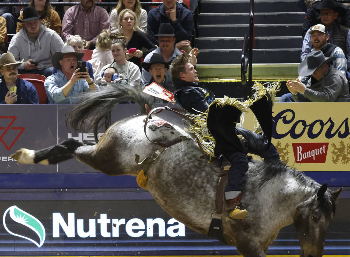 Jacob Lees holds on to his horse while he competes in bareback riding on day six of the Nationa ...