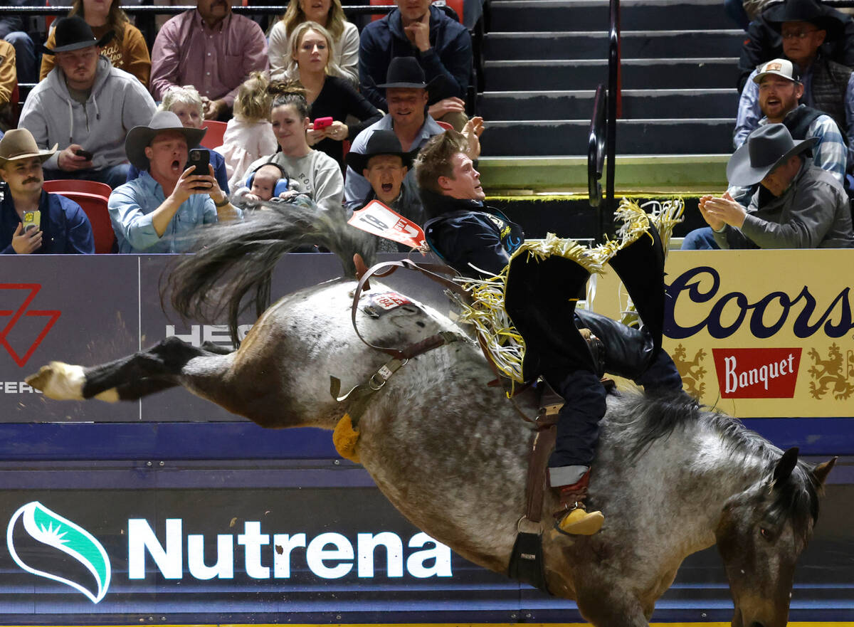 Jacob Lees holds on to his horse while he competes in bareback riding on day six of the Nationa ...