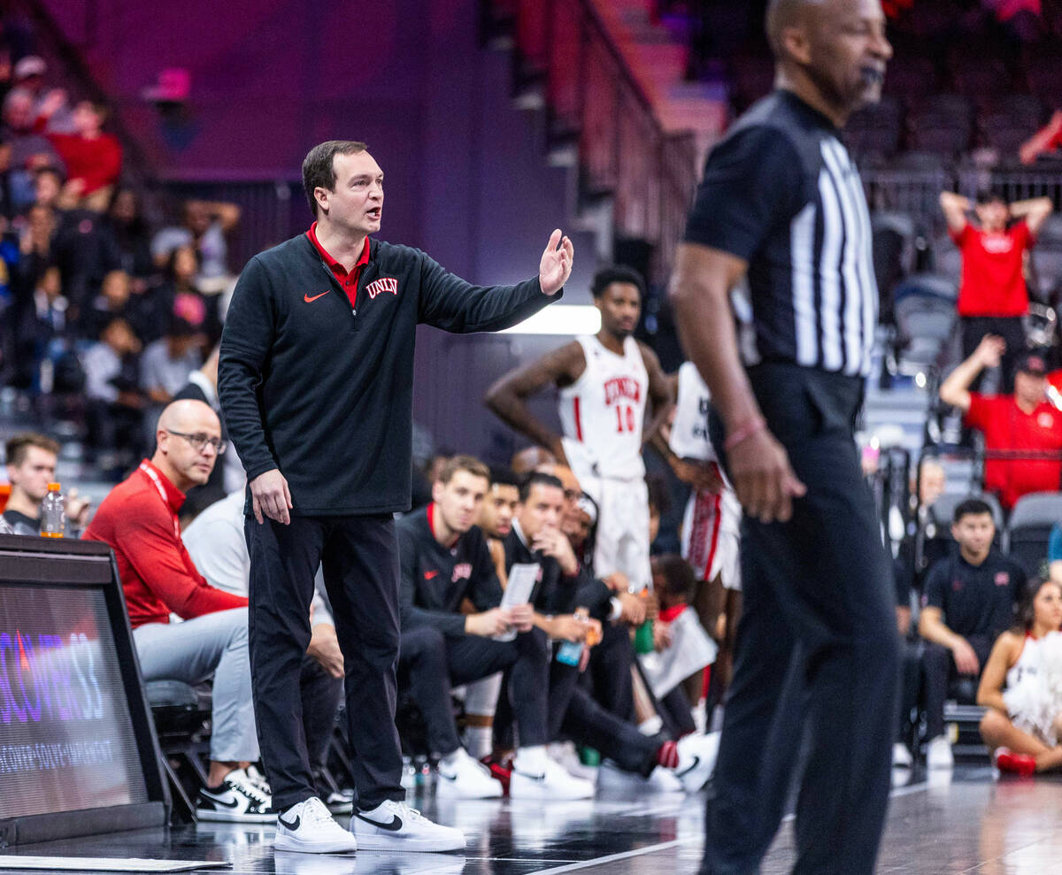 UNLV Rebels head coach Kevin Kruger calls to his players against the Creighton Bluejays during ...