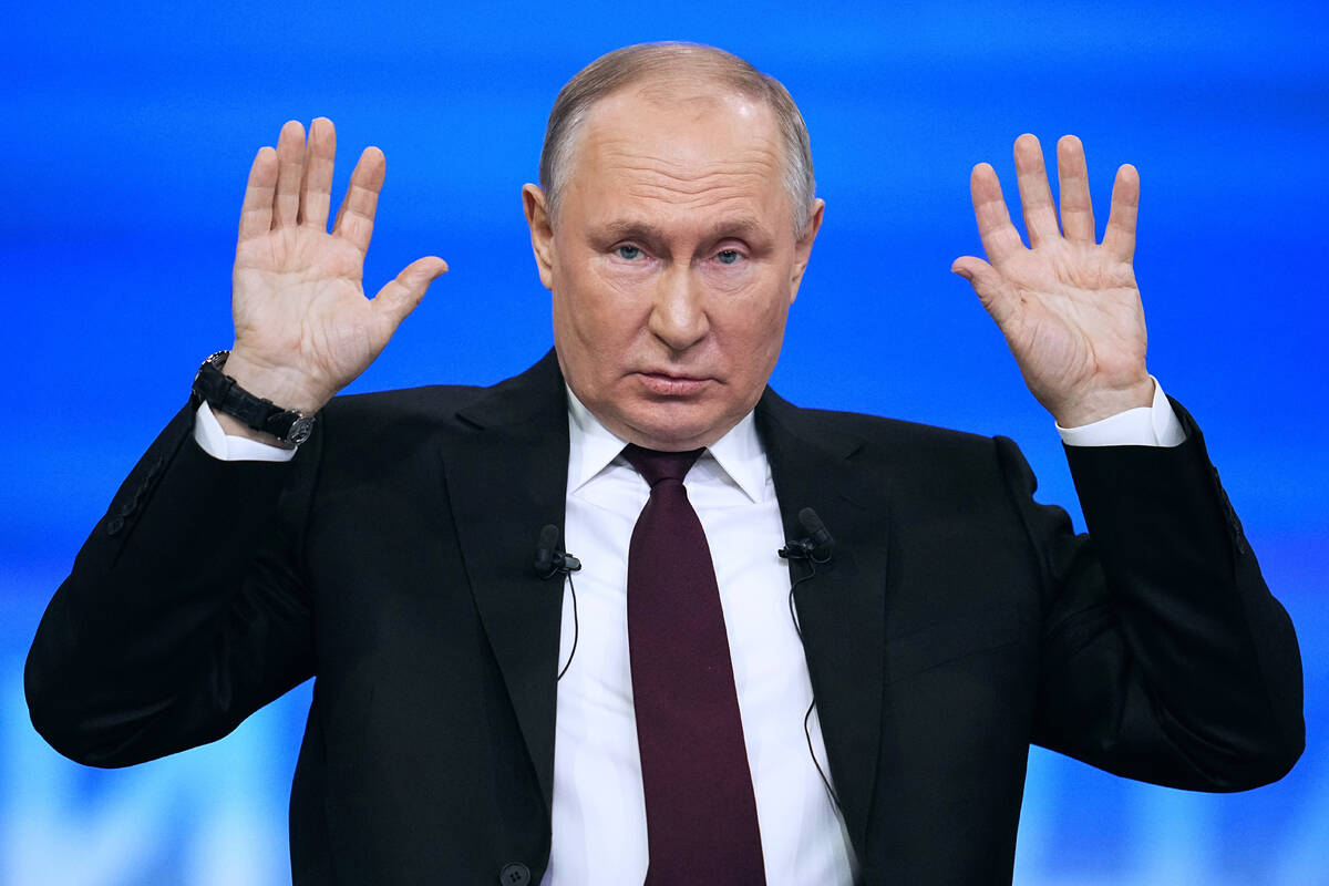 Russian President Vladimir Putin speaks during his annual news conference in Moscow, Russia, Th ...