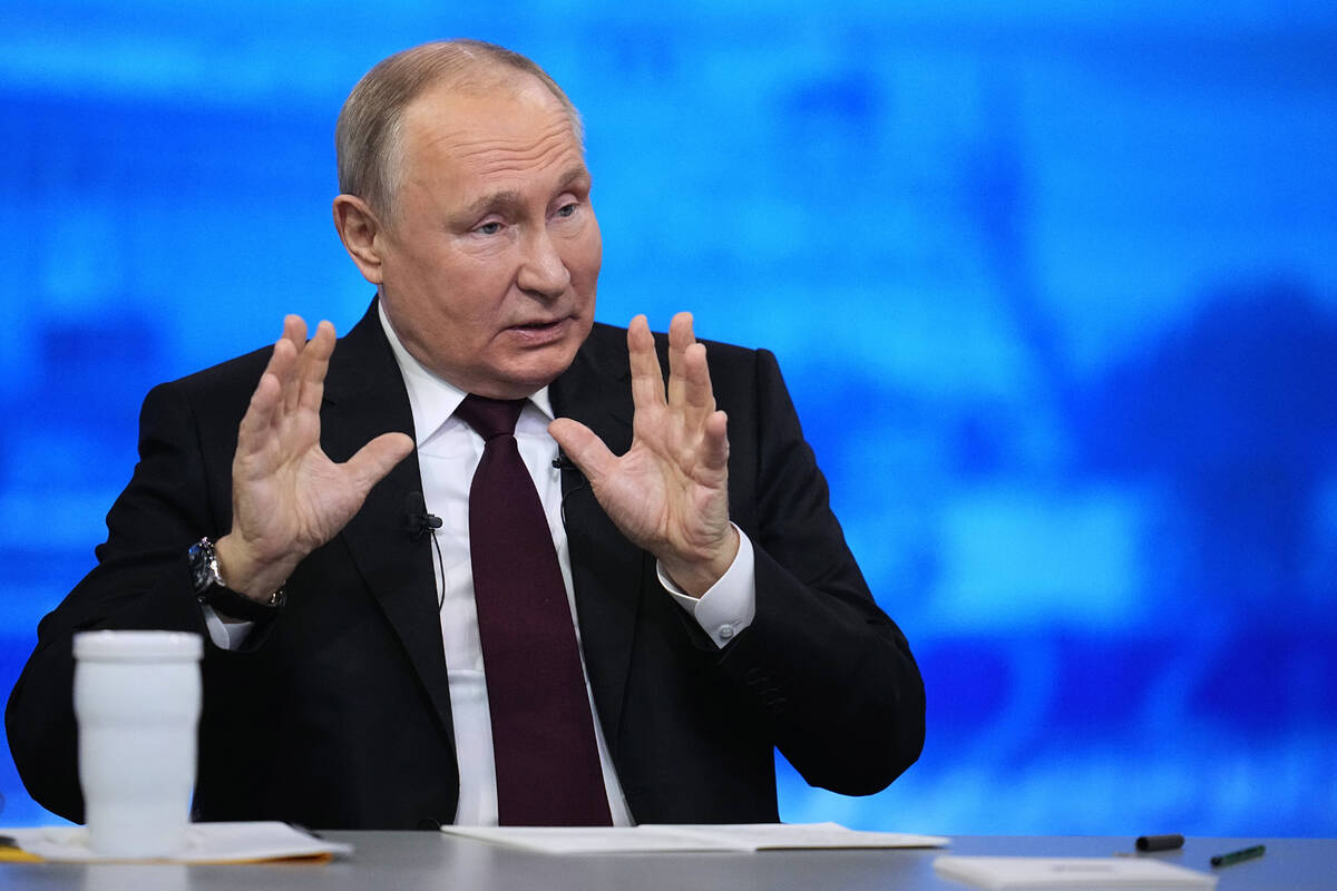 Russian President Vladimir Putin speaks during his annual news conference in Moscow, Russia, Th ...