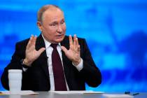 Russian President Vladimir Putin speaks during his annual news conference in Moscow, Russia, Th ...