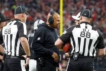 Raiders Interim Coach Antonio Pierce argues with officials about a call during the second half ...