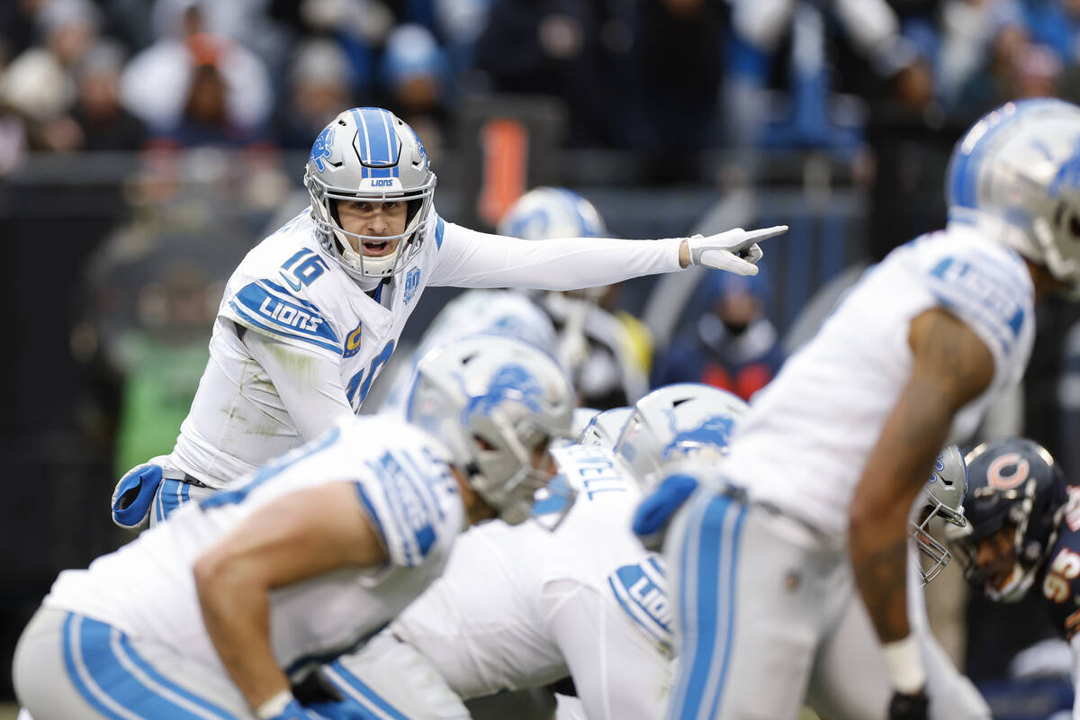 Detroit Lions quarterback Jared Goff (16) directs his teammates against the Chicago Bears durin ...