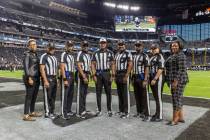 NFL officials pose for a group picture before the Las Vegas Raiders played against the Los Ange ...