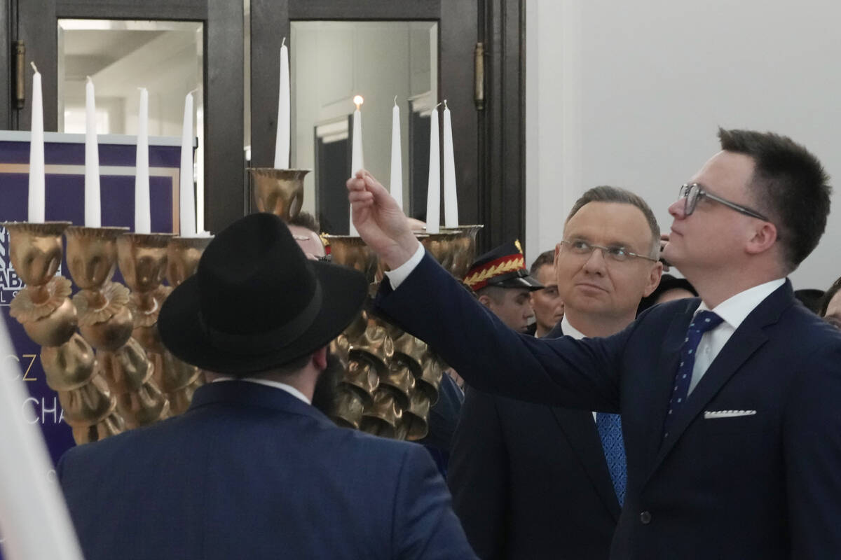 After antisemitic incident, top Polish leaders celebrate Hanukkah in parliament