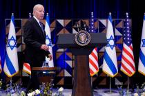 FILE - President Joe Biden walks to the podium to deliver remarks on the war between Israel and ...
