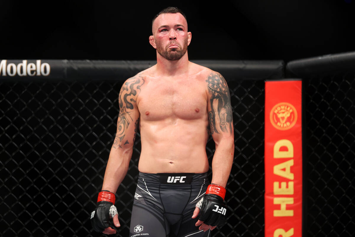 Colby Covington reacts after landing a low blow against Jorge Masdival in the second round of a ...
