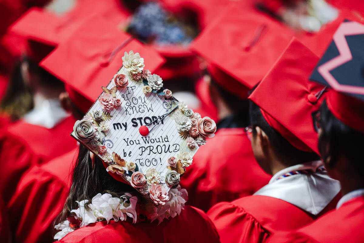 A UNLV graduate’s decorated academic cap at the winter commencement ceremony at the Thom ...