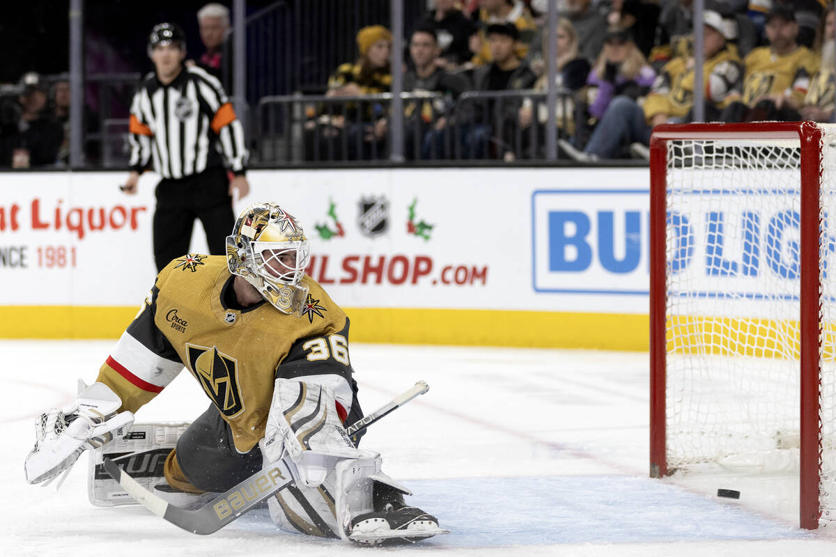 Golden Knights goaltender Logan Thompson (36) misses the save on a Sabres goal during the secon ...