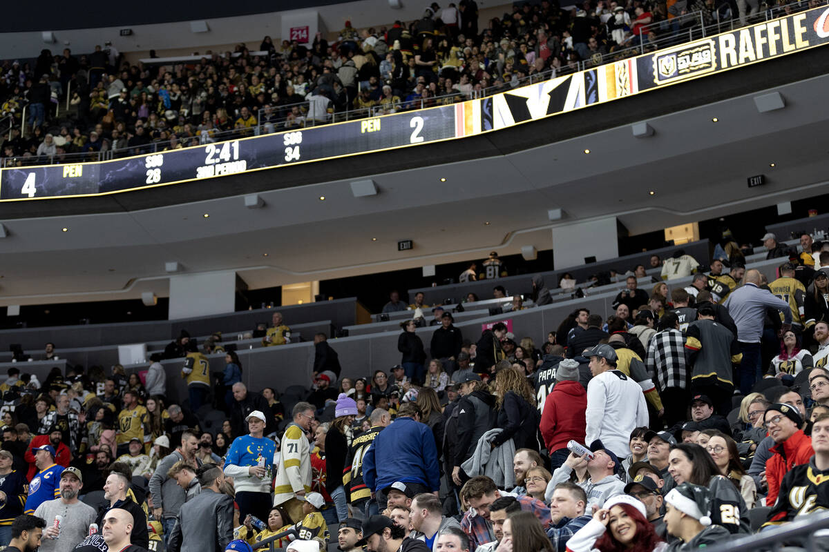 Golden Knights fans leave as their team is losing during the third period of an NHL hockey game ...