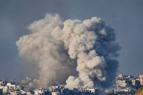 Smoke rises following an Israeli bombardment in the Gaza Strip, as seen from southern Israel, S ...