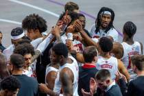 UNLV Rebels players gather in a huddle against the Creighton Bluejays during the second half of ...