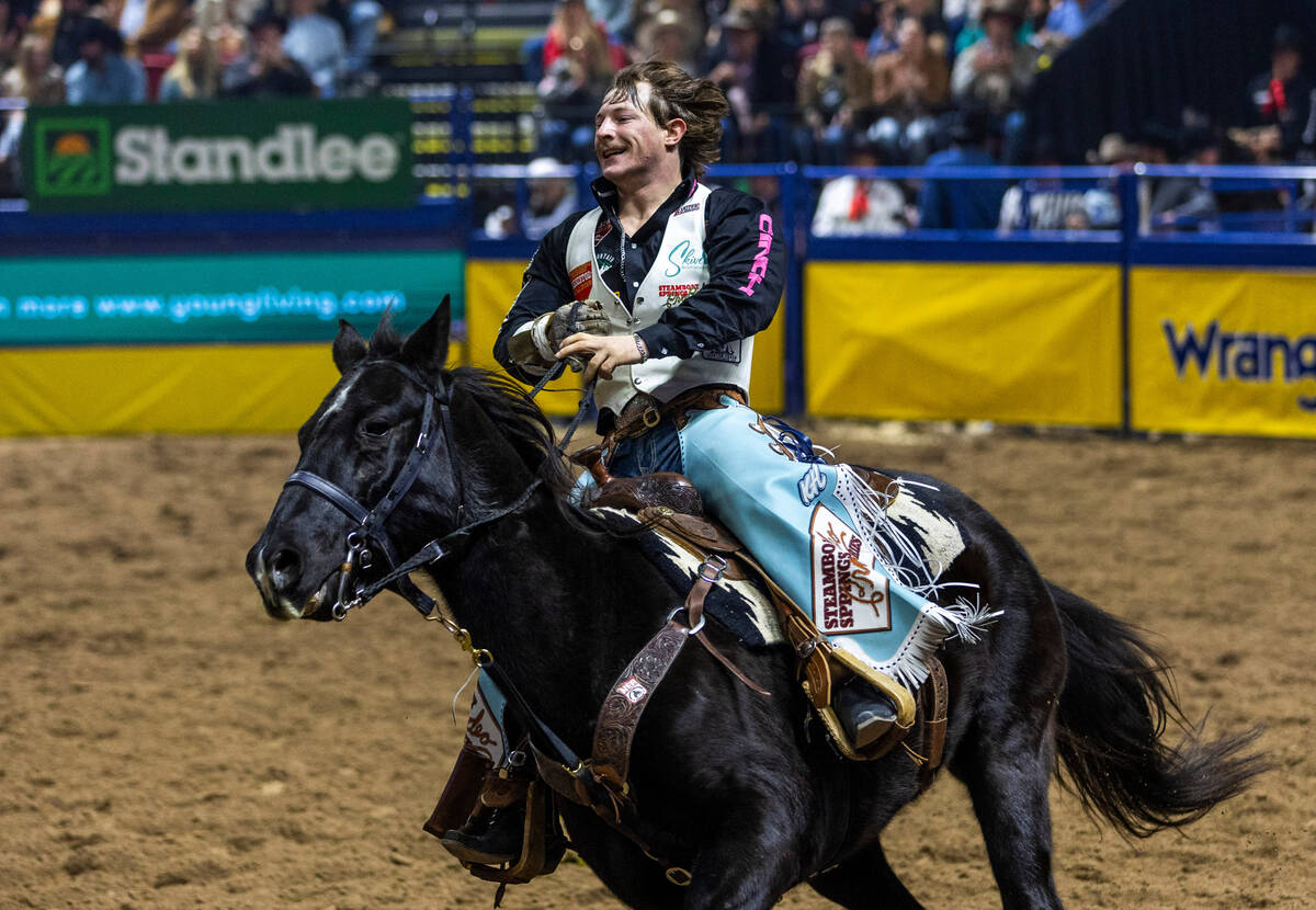 Keenan Hayes celebrates his PRCA World Championship in Bareback Riding during the final day act ...