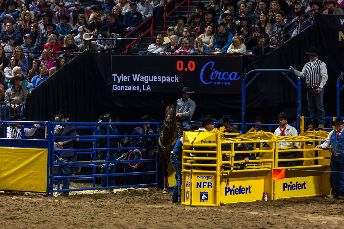 Tyler Waguespack struggles to take down his steer in Steer Wrestling during the final day actio ...