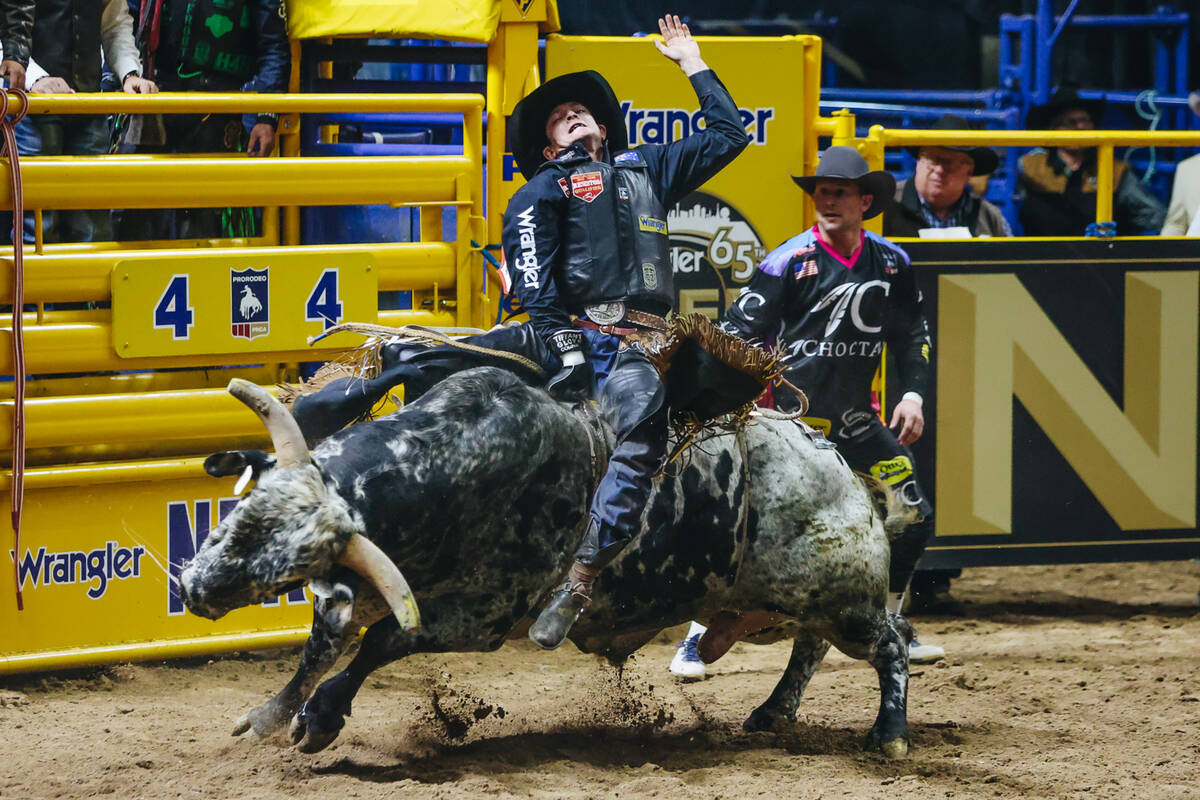 Ky Hamilton rides the bull during the National Finals Rodeo at the Thomas & Mack Center on ...