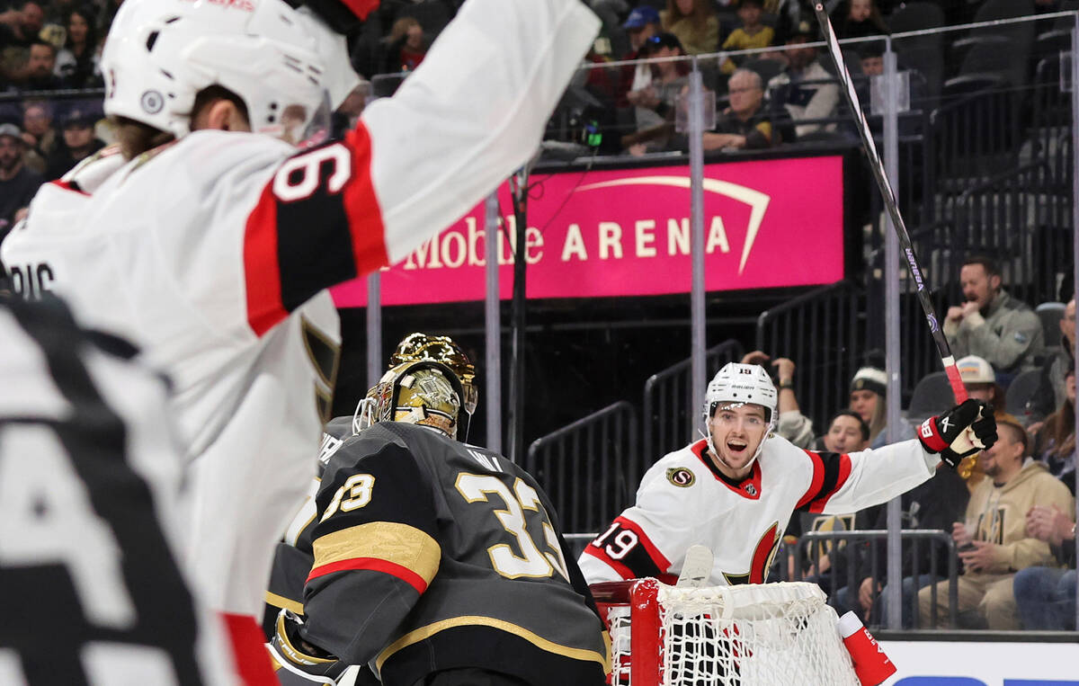 Ottawa Senators right wing Drake Batherson (19) celebrates as center Josh Norris, left, scores ...