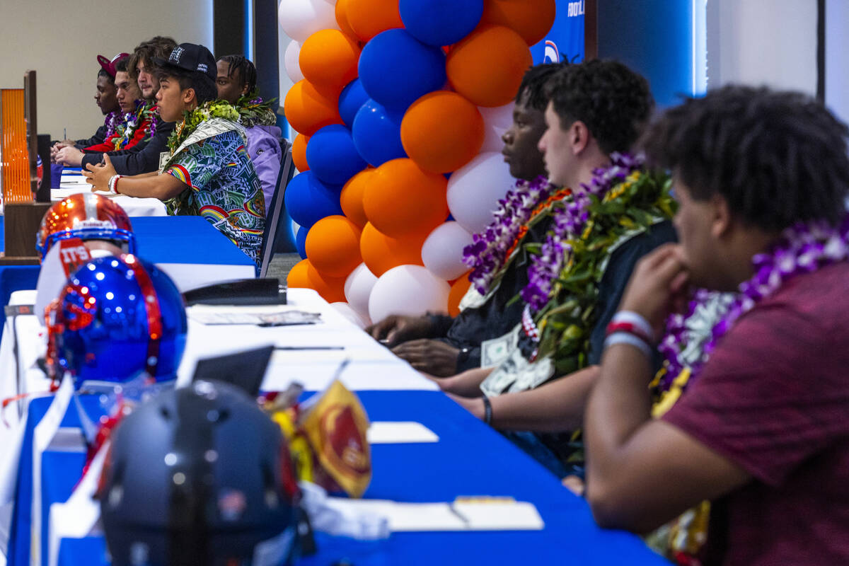 Bishop Gorman football players listen to introductions during a National Signing Day event ther ...