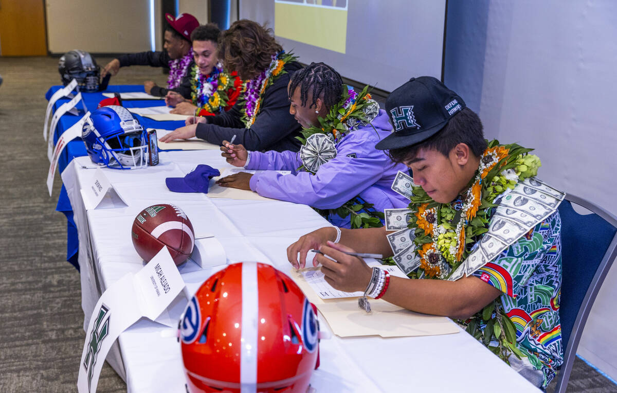 Bishop Gorman players Jaylon Edmond, Audric Harris, Alexander Ruggeroli, Devon Rice and Micah A ...