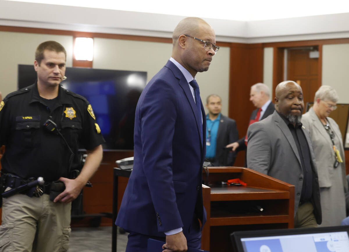 Nevada Attorney General Aaron Ford enters the courtroom where Nevada Republicans accused in a f ...