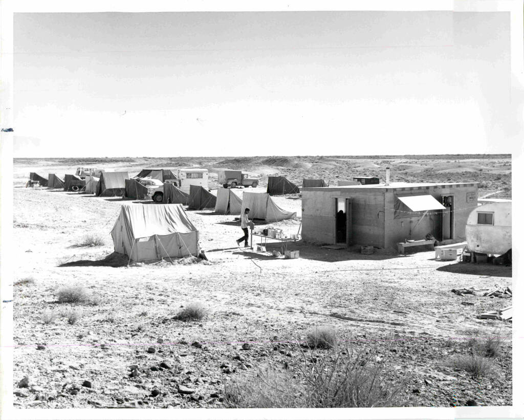 Tents in assorted sizes and a temporary shack house team of 17 men and four women archaeologist ...
