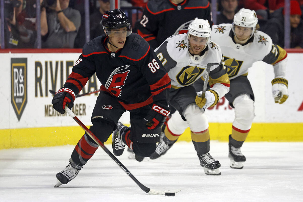 Carolina Hurricanes' Teuvo Teravainen (86) moves the puck up the ice after taking it from Vegas ...