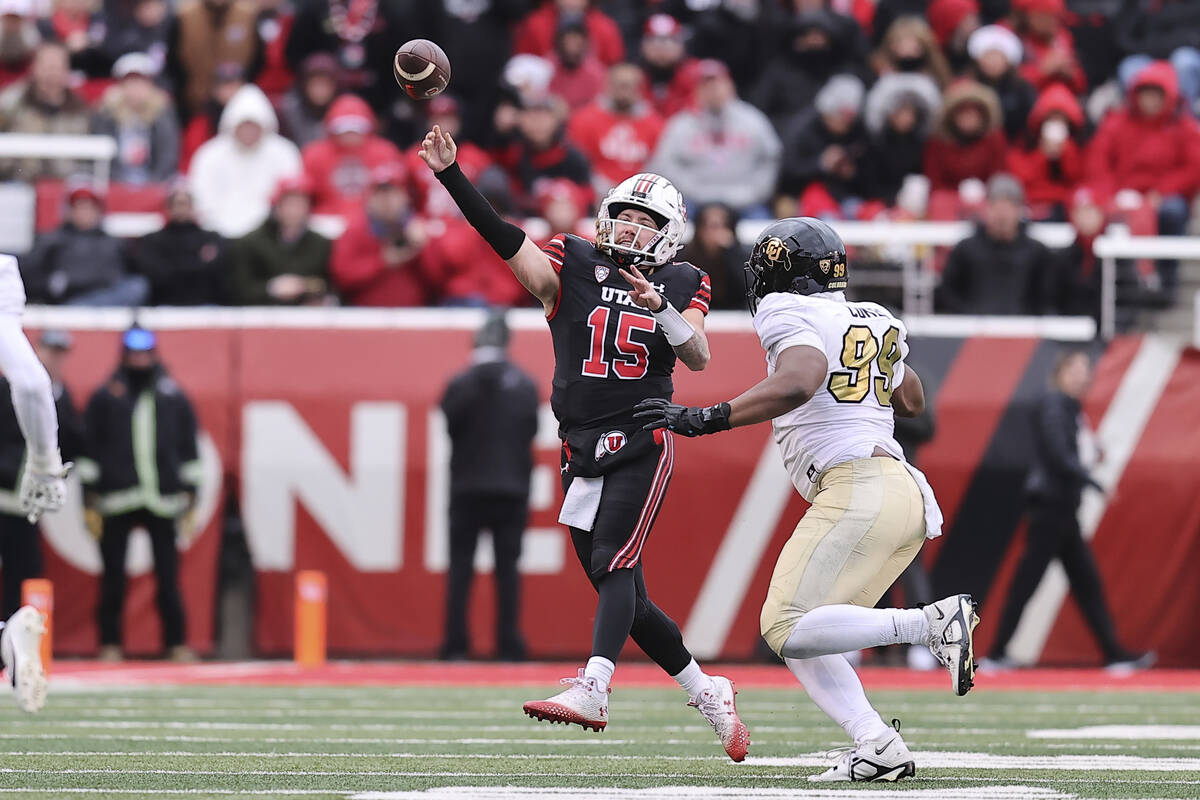 Utah quarterback Luke Bottari (15) throws the ball against Colorado defensive lineman Shane Cok ...