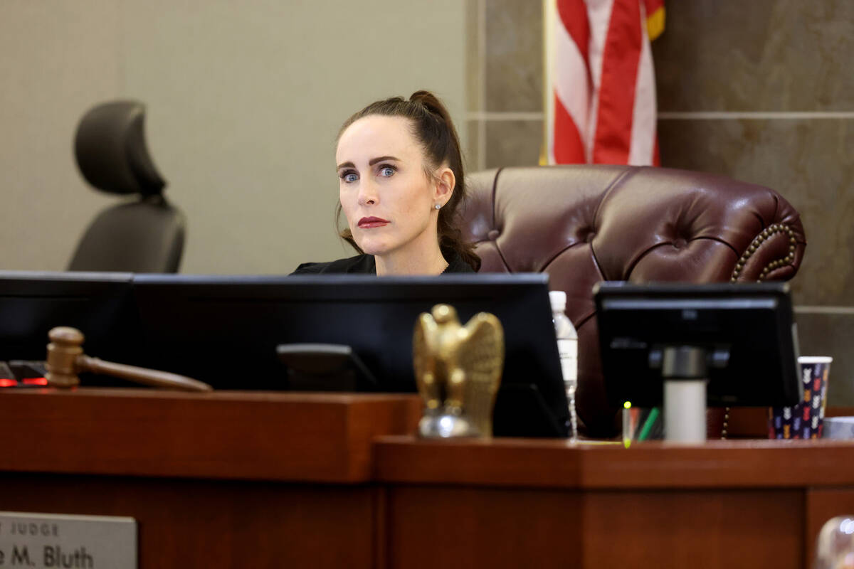 Clark County District Court Judge Jacqueline Bluth listens to arguments during a court hearing ...