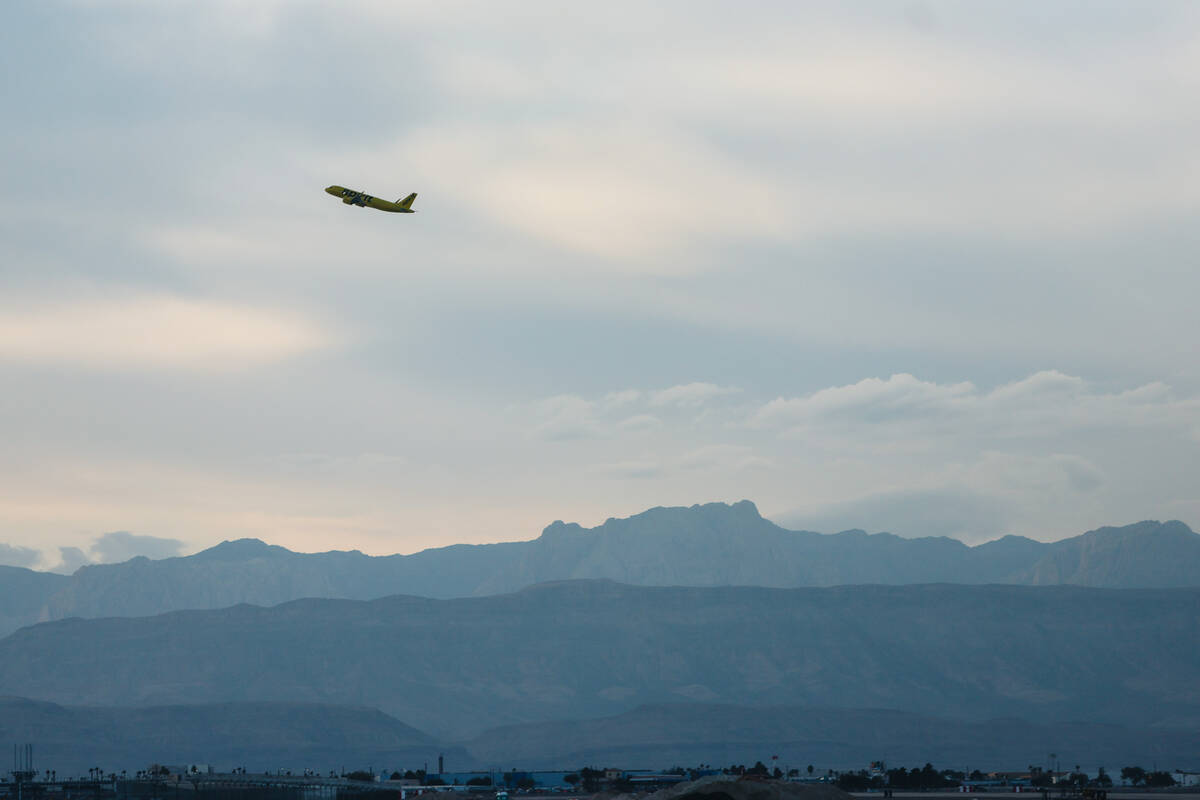 An airplane takes off from Harry Reid International Airport on Wednesday, Dec. 20, 2023, in Las ...
