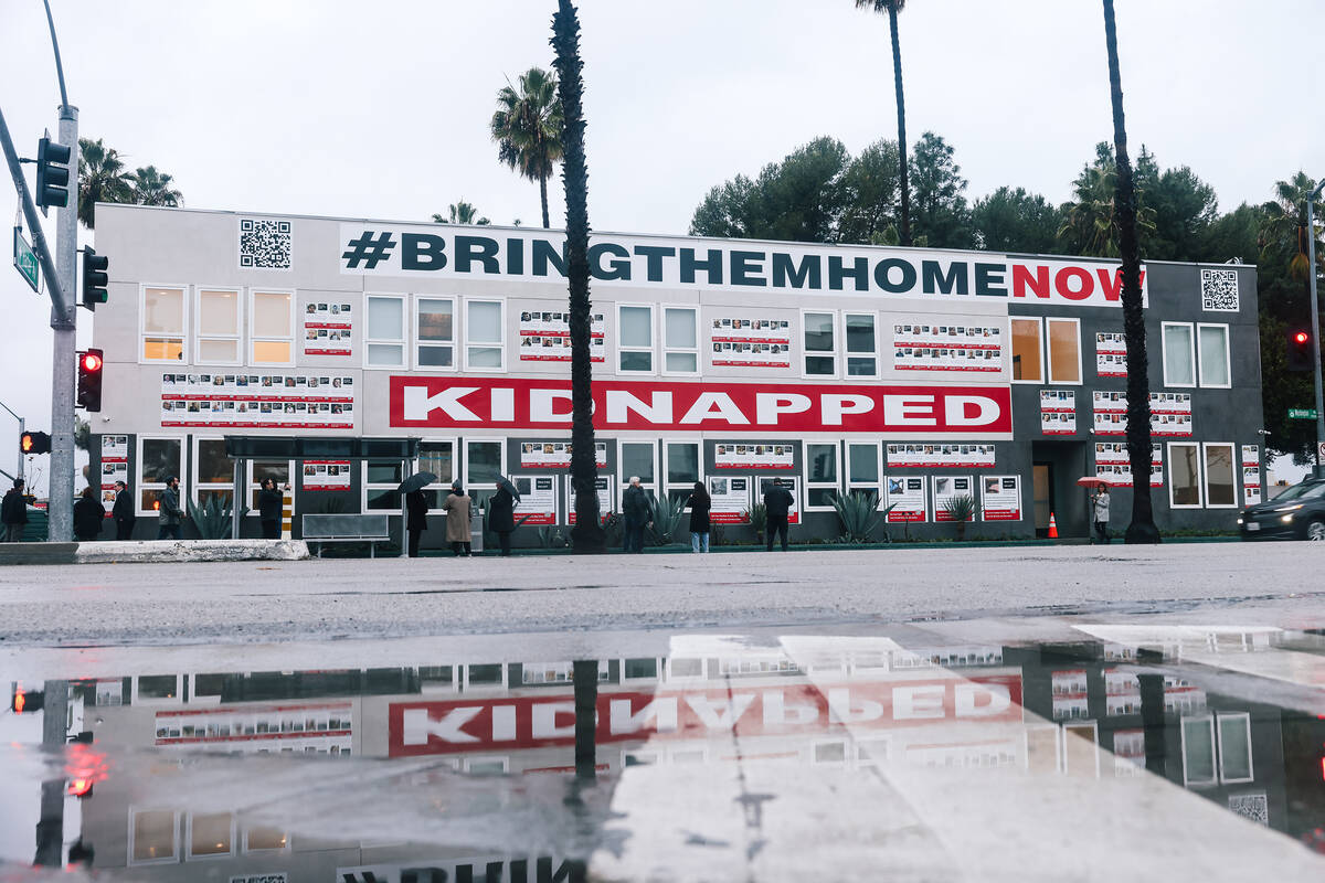 Artists create massive 'kidnapped' posters of Israeli hostages that can't be torn down | Nation and World - Vimarsana News