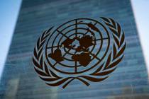 FILE - The symbol of the United Nations is displayed outside the Secretariat Building, Feb. 28, ...