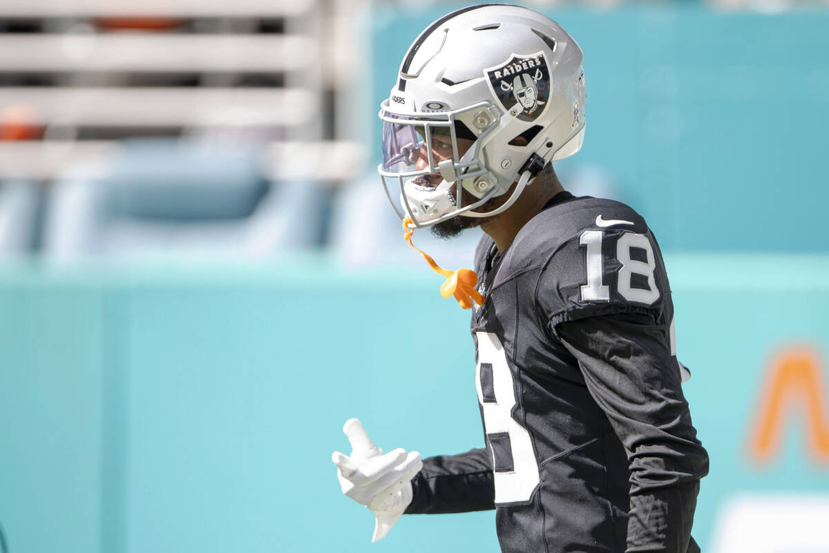 Raiders cornerback Jack Jones (18) warms up before an NFL game against the Miami Dolphins on Su ...