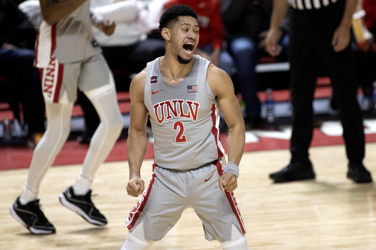 UNLV Rebels guard Justin Webster (2) celebrates after Hofstra was called for a foul during the ...